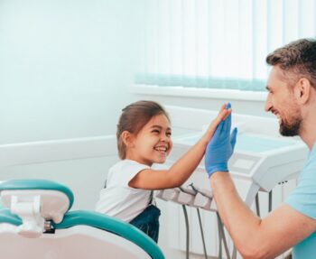 what are the benefits of seeing a pediatric dentist early